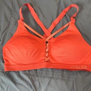Victoria’s Secret Coral Strappy Padded Sports Bra, size 36C, NWOT.